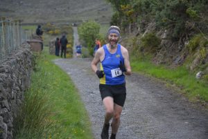 Number 14 Peter McEvoy (Mourne Runners 37 overall in 48:29)